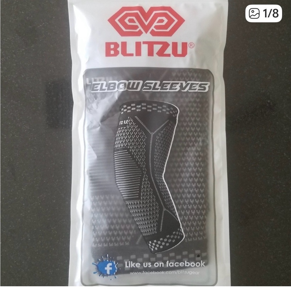 NEW IN PKG TWO sets of TWO Compression Elbow Sleeves Wellness Workout Trainers